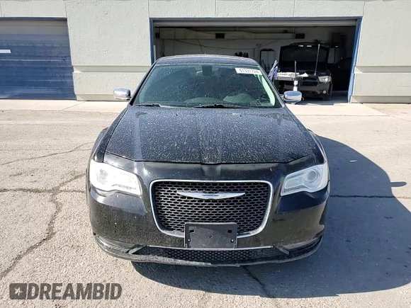 2015 Chrysler 300 C with VIN 2C3CCAET4FH772748, listed as a Copart auction lot 61331724 with 97,856 mi miles and Salvage Title. Bid and sale history available at DreamBid. Image 11.