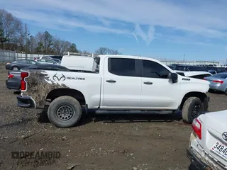2021 Chevrolet Silverado 1500 Custom Trail Boss with VIN 3GCPYCEF5MG400692, listed as a IAAI auction lot 41560619 with 101,962 mi miles and . Bid and sale history available at DreamBid. Image 14.