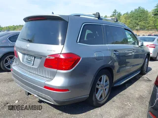 2014 Mercedes-Benz GL 450 with VIN 4JGDF7CE0EA290673, listed as a IAAI auction lot 42207889 with 132,251 mi miles and . Bid and sale history available at DreamBid. Image 4.