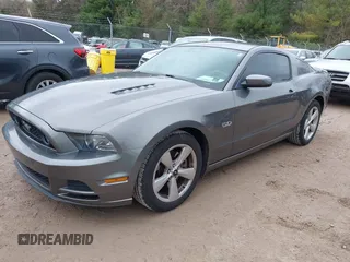 2013 Ford Mustang GT with VIN 1ZVBP8CF1D5261761, listed as a IAAI auction lot 42173607 with 76,658 mi miles and . Bid and sale history available at DreamBid. Image 21.