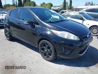 2011 Ford Fiesta SES with VIN 3FADP4FJ9BM181965, listed as a IAAI auction lot 42092140 with 150,304 mi miles. Bid and sale history available at carsss.com. Image 1.