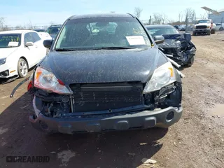 2007 Honda CR-V LX with VIN JHLRE48307C072357, listed as a IAAI auction lot 41850670 with 199,479 mi miles. Bid and sale history available at carsss.com. Image 13.