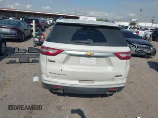 2020 Chevrolet Traverse High Country with VIN 1GNEVNKWXLJ135322, listed as a IAAI auction lot 42042466 with 105,748 mi miles and . Bid and sale history available at DreamBid. Image 16.