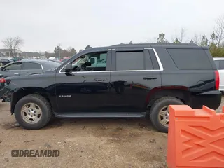 2020 Chevrolet Tahoe LS z VIN 1GNSCAKC1LR177807, wystawiony jako IAAI lot #41482578 z przebiegiem 75 010 mil mil oraz . Historia ofert i sprzedaży dostępna na DreamBid. Obrazek 15.