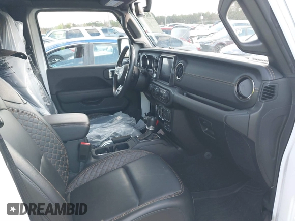2021 Jeep Wrangler Unlimited Sahara with VIN 1C4JJXP64MW840094, listed as a IAAI auction lot 40830676 with 31,716 mi miles and . Bid and sale history available at DreamBid. Image 5.
