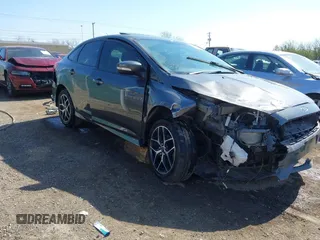 2015 Ford Focus SE with VIN 1FADP3F29FL268677, listed as a IAAI auction lot 42037244 with 118,018 mi miles. Bid and sale history available at carsss.com. Image 6.