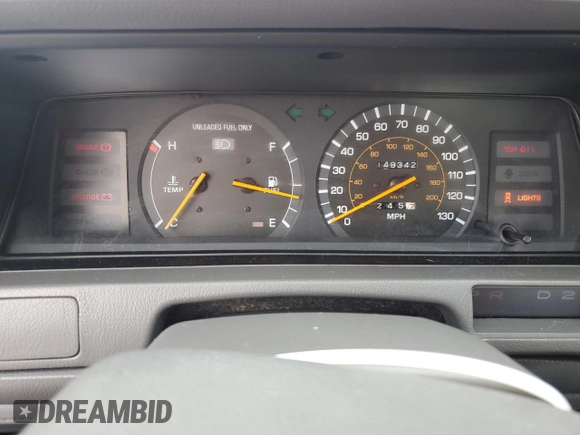 1991 Toyota Camry DLX z VIN 4T1SV21E0MU450578, wystawiony jako Copart lot #73990024 z przebiegiem 149 342 mil mil oraz Czysty tytuł • Clean title. Historia ofert i sprzedaży dostępna na DreamBid. Obrazek 9.