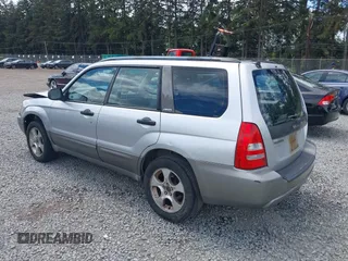 2003 Subaru Forester XS with VIN JF1SG65683H772567, listed as a IAAI auction lot 42239379 with 285,002 mi miles and . Bid and sale history available at DreamBid. Image 3.