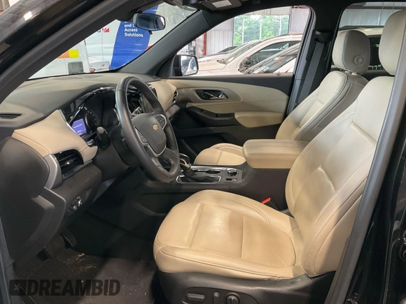 2022 Chevrolet Traverse LT with VIN 1GNERHKW8NJ150023, listed as a IAAI auction lot 42585752 with 102,823 mi miles and . Bid and sale history available at DreamBid. Image 3.