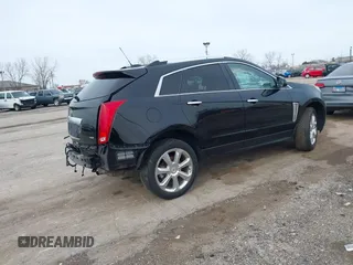 2015 Cadillac SRX Premium Collection with VIN 3GYFNGE37FS556860, listed as a IAAI auction lot 41854634 with 170,808 mi miles and . Bid and sale history available at DreamBid. Image 4.