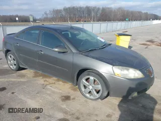 2005 Pontiac G6 GT with VIN 1G2ZH528954147048, listed as a IAAI auction lot 41202223 with 206,106 mi miles. Bid and sale history available at carsss.com. Image 1.