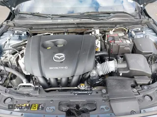 2020 Mazda 3 Premium z VIN JM1BPBNM9L1174949, wystawiony jako IAAI lot #41728868 z przebiegiem 68 968 mil mil oraz . Historia ofert i sprzedaży dostępna na DreamBid. Obrazek 10.