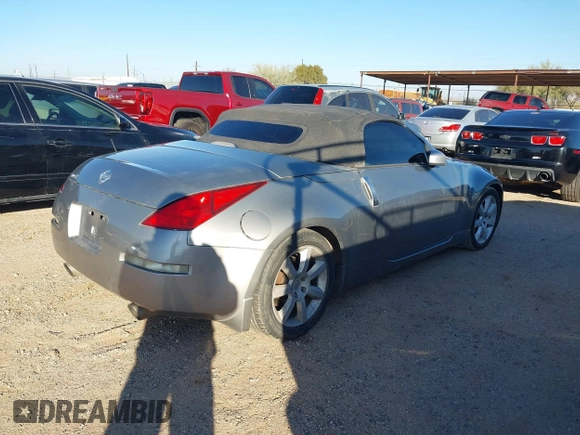 2005 Nissan 350Z Touring z VIN JN1AZ36A25M754869, wystawiony jako IAAI lot #41429477 z przebiegiem 110 896 mil mil oraz . Historia ofert i sprzedaży dostępna na DreamBid. Obrazek 4.