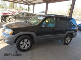 2002 Mazda Tribute LX with VIN 4F2CU08172KM58561, listed as a IAAI auction lot 41435407 with 141,908 mi miles and . Bid and sale history available at carsss.com. Image 14.