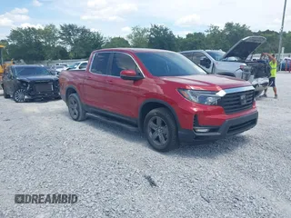 2023 Honda Ridgeline RTL with VIN 5FPYK3F51PB014283, listed as a IAAI auction lot 42725679 with 16,847 mi miles and . Bid and sale history available at DreamBid. Image 1.