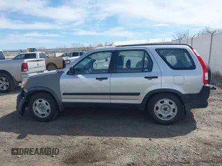2006 Honda CR-V LX with VIN JHLRD785X6C057434, listed as a IAAI auction lot 41881971 with 210,658 mi miles and . Bid and sale history available at carsss.com. Image 14.