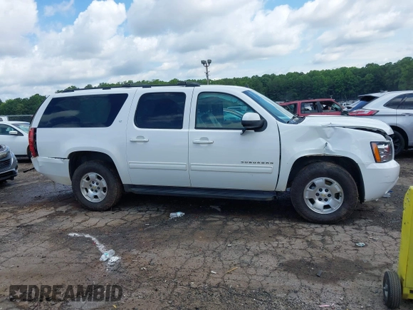 2014 Chevrolet Suburban LT with VIN 1GNSCJE07ER211222, listed as a IAAI auction lot 42428084 with 214,712 mi miles and . Bid and sale history available at DreamBid. Image 6.