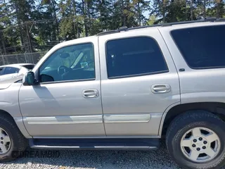 2004 Chevrolet Tahoe LS with VIN 1GNEK13Z84J232031, listed as a IAAI auction lot 42073698 with 193,889 mi miles. Bid and sale history available at carsss.com. Image 15.