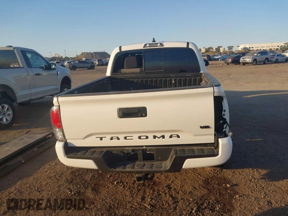 2023 Toyota Tacoma 4WD SR with VIN 3TMCZ5AN8PM647845, listed as a IAAI auction lot 41371634 with 21,917 mi miles. Bid and sale history available at carsss.com. Image 17.