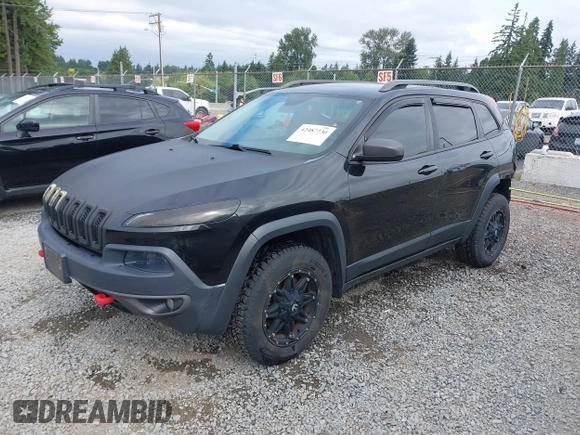 2014 Jeep Cherokee Trailhawk z VIN 1C4PJMBB1EW145683, wystawiony jako IAAI lot #42487730 z przebiegiem 148 277 mil mil oraz . Historia ofert i sprzedaży dostępna na DreamBid. Obrazek 18.