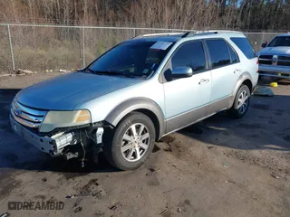 2008 Ford Taurus X SEL with VIN 1FMDK02W58GA33572, listed as a IAAI auction lot 41386299 with 174,484 mi miles. Bid and sale history available at carsss.com. Image 2.
