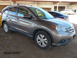 2014 Honda CR-V EX-L with VIN 2HKRM4H72EH665478, listed as a IAAI auction lot 41970335 with 119,557 mi miles. Bid and sale history available at carsss.com. Image 1.