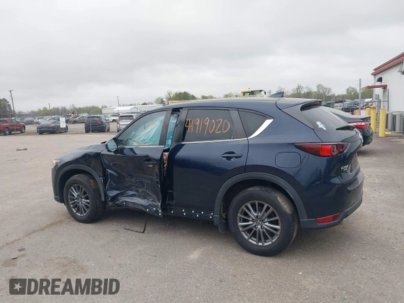 2017 Mazda CX-5 Touring with VIN JM3KFBCL9H0163449, listed as a IAAI auction lot 41919020 with 102,898 mi miles. Bid and sale history available at carsss.com. Image 14.