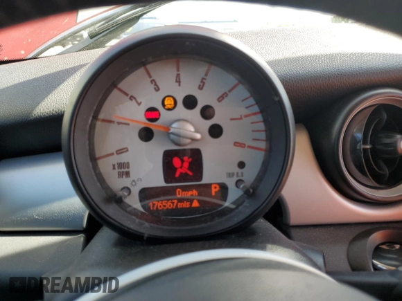 2012 MINI Hardtop with VIN WMWSU3C53CT257045, listed as a Copart auction lot 51662035 with 176,567 mi miles and Salvage Title. Bid and sale history available at DreamBid. Image 9.