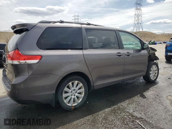 2012 Toyota Sienna LE with VIN 5TDJK3DC8CS047122, listed as a Copart auction lot 52036115 with 76,869 mi miles and Salvage Title. Bid and sale history available at carsss.com. Image 3.