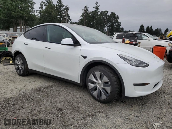 2023 Tesla Model Y Long Range z VIN 7SAYGDEE9PA081604, wystawiony jako Copart lot #60163785 z przebiegiem 42 134 mil mil oraz Szkoda całkowita • Salvage title. Historia ofert i sprzedaży dostępna na DreamBid. Obrazek 4.