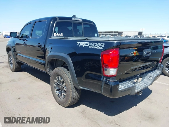 2016 Toyota Tacoma SR with VIN 3TMCZ5AN3GM019210, listed as a IAAI auction lot 42003617 with 171,581 mi miles. Bid and sale history available at carsss.com. Image 3.