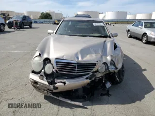 2001 Mercedes-Benz E-Class with VIN WDBJF65J11B357893, listed as a Copart auction lot 48573305 with 141,044 mi miles and Salvage Title. Bid and sale history available at carsss.com. Image 5.
