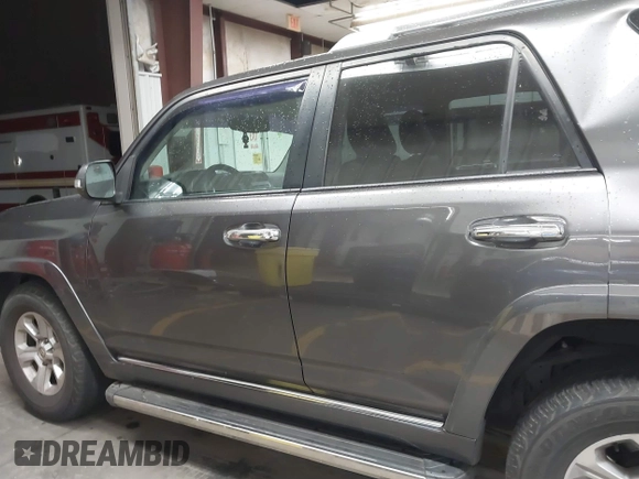 2011 Toyota 4Runner SR5 with VIN JTEZU5JR7B5017417, listed as a IAAI auction lot 41765420 with 165,714 mi miles and . Bid and sale history available at DreamBid. Image 14.