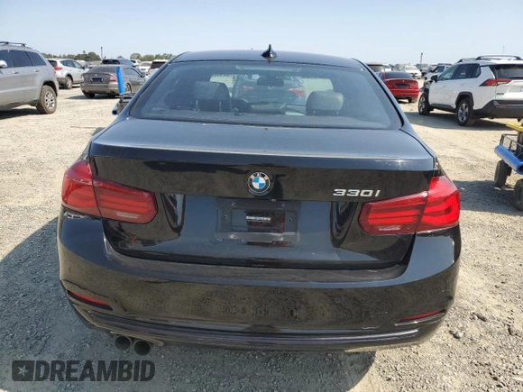 2018 BMW 3 Series 330i with VIN WBA8B9G52JNU98674, listed as a Copart auction lot 59783985 with 77,712 mi miles and Clean title. Bid and sale history available at DreamBid. Image 6.