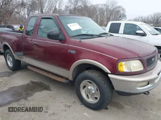 1997 Ford F-150 z VIN 1FTDX08W4VKD39667, wystawiony jako IAAI lot #41537371 z przebiegiem 300 671 mil mil oraz . Historia ofert i sprzedaży dostępna na DreamBid. Obrazek 1.