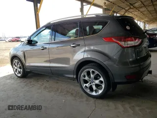 2014 Ford Escape Titanium с VIN 1FMCU0J91EUA21918, выставлен на аукционе Copart как лот 59161865 с пробегом 118 003 миль миль и Списание • Salvage title. История ставок и продаж доступна на DreamBid. Изображение 2.