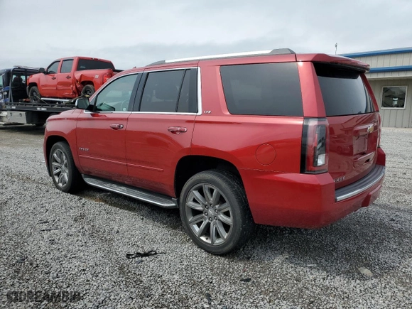 2015 Chevrolet Tahoe LTZ with VIN 1GNSKCKCXFR723104, listed as a Copart auction lot 50660325 with 198,740 mi miles and Salvage Title. Bid and sale history available at carsss.com. Image 2.