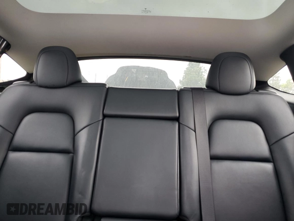 2021 Tesla Model Y Long Range z VIN 5YJYGAEE5MF143672, wystawiony jako Copart lot #55962875 z przebiegiem 74 644 mil mil oraz Szkoda całkowita • Salvage title. Historia ofert i sprzedaży dostępna na DreamBid. Obrazek 10.