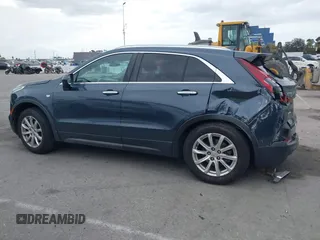 2019 Cadillac XT4 AWD Luxury with VIN 1GYFZBR41KF160352, listed as a IAAI auction lot 42047477 with 58,850 mi miles and . Bid and sale history available at DreamBid. Image 14.