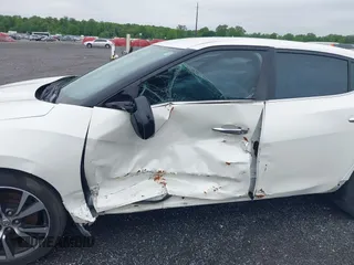 2016 Nissan Maxima SV z VIN 1N4AA6AP2GC375242, wystawiony jako IAAI lot #42220608 z przebiegiem 59 983 mil mil oraz . Historia ofert i sprzedaży dostępna na DreamBid. Obrazek 6.