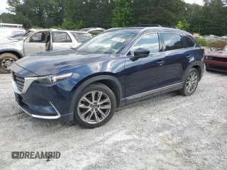 2019 Mazda CX-9 Grand Touring z VIN JM3TCBDY8K0302260, wystawiony jako Copart lot #57512565 z przebiegiem 132 974 mil mil oraz Czysty tytuł • Clean title. Historia ofert i sprzedaży dostępna na DreamBid. Obrazek 1.