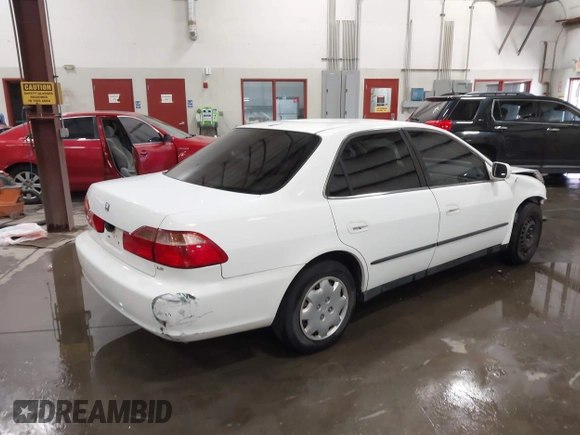 1999 Honda Accord LX with VIN 1HGCG6655XA043768, listed as a IAAI auction lot 42349237 with Not provided miles and . Bid and sale history available at DreamBid. Image 4.