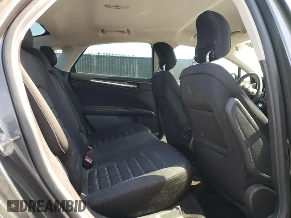 2015 Ford Fusion SE z VIN 3FA6P0HDXFR108055, wystawiony jako Copart lot #54801165 z przebiegiem 99 728 mil mil oraz Szkoda całkowita • Salvage title. Historia ofert i sprzedaży dostępna na DreamBid. Obrazek 10.