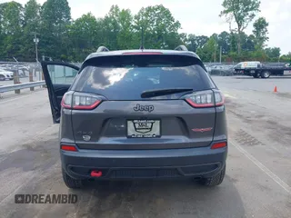 2020 Jeep Cherokee Trailhawk with VIN 1C4PJMBX5LD530720, listed as a IAAI auction lot 42404948 with 99,606 mi miles and . Bid and sale history available at DreamBid. Image 16.