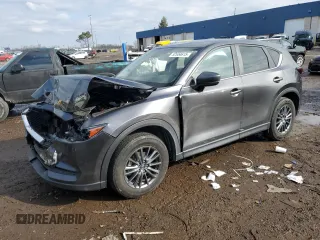 2021 Mazda CX-5 Touring z VIN JM3KFBCM6M1343324, wystawiony jako Copart lot #52634615 z przebiegiem 73 218 mil mil oraz Nie do naprawy. Historia ofert i sprzedaży dostępna na DreamBid. Obrazek 1.