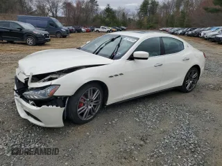 2016 Maserati Ghibli S Q4 z VIN ZAM57RTA1G1177103, wystawiony jako Copart lot #52797195 z przebiegiem Nie podano mil oraz Nie do naprawy. Historia ofert i sprzedaży dostępna na DreamBid. Obrazek 1.