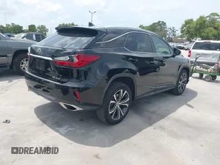 2016 Lexus RX 350 with VIN 2T2ZZMCA6GC023710, listed as a IAAI auction lot 42201278 with 126,873 mi miles and . Bid and sale history available at DreamBid. Image 4.