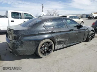 2015 BMW M5 with VIN WBSFV9C5XFD595148, listed as a Copart auction lot 46157335 with 77,582 mi miles and Salvage Title. Bid and sale history available at carsss.com. Image 3.