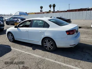 2017 Volkswagen Jetta SEL with VIN 3VWL17AJ3HM297202, listed as a Copart auction lot 57959785 with 113,408 mi miles and Salvage title. Bid and sale history available at DreamBid. Image 2.