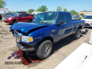 2011 Ford Ranger XLT with VIN 1FTLR4FE6BPB14799, listed as a IAAI auction lot 42233894 with 142,019 mi miles and . Bid and sale history available at DreamBid. Image 2.